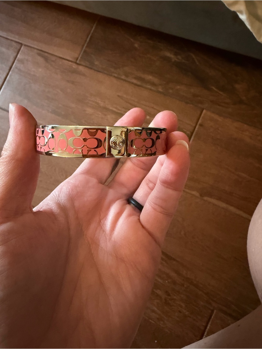 Coach Silvertone Signature Cuff Bracelet in Coral Pink